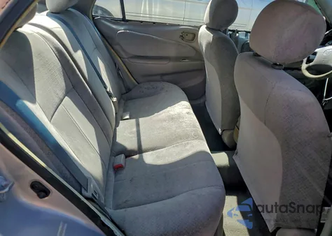 1999 Toyota Corolla Ve from USA, damaged, VIN 1NXBR12E4XZ193524